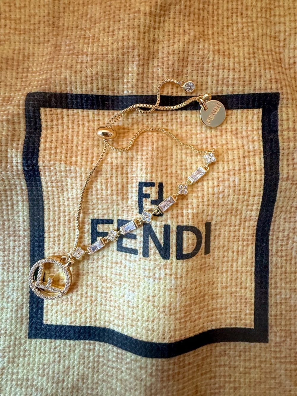 Fendi Gold-Tone Logo bracelet with Crystal Bar Accents